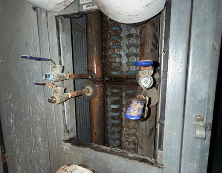 Measuring Three, Hidden Chilled Water Coils for Replacement.